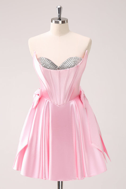 Pink A-Line Strapless Corset Beaded Homecoming Dress with Bows