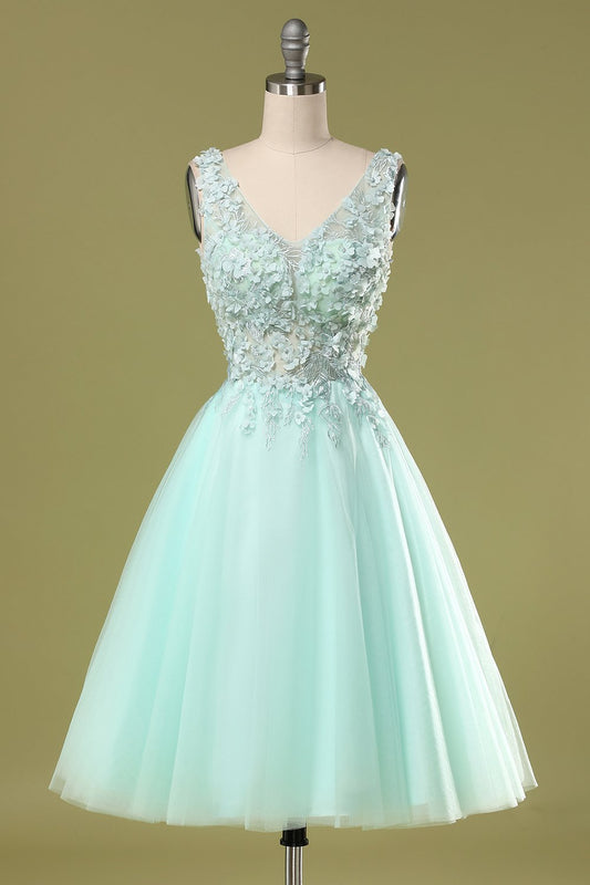Robe de bal courte vert menthe avec applications