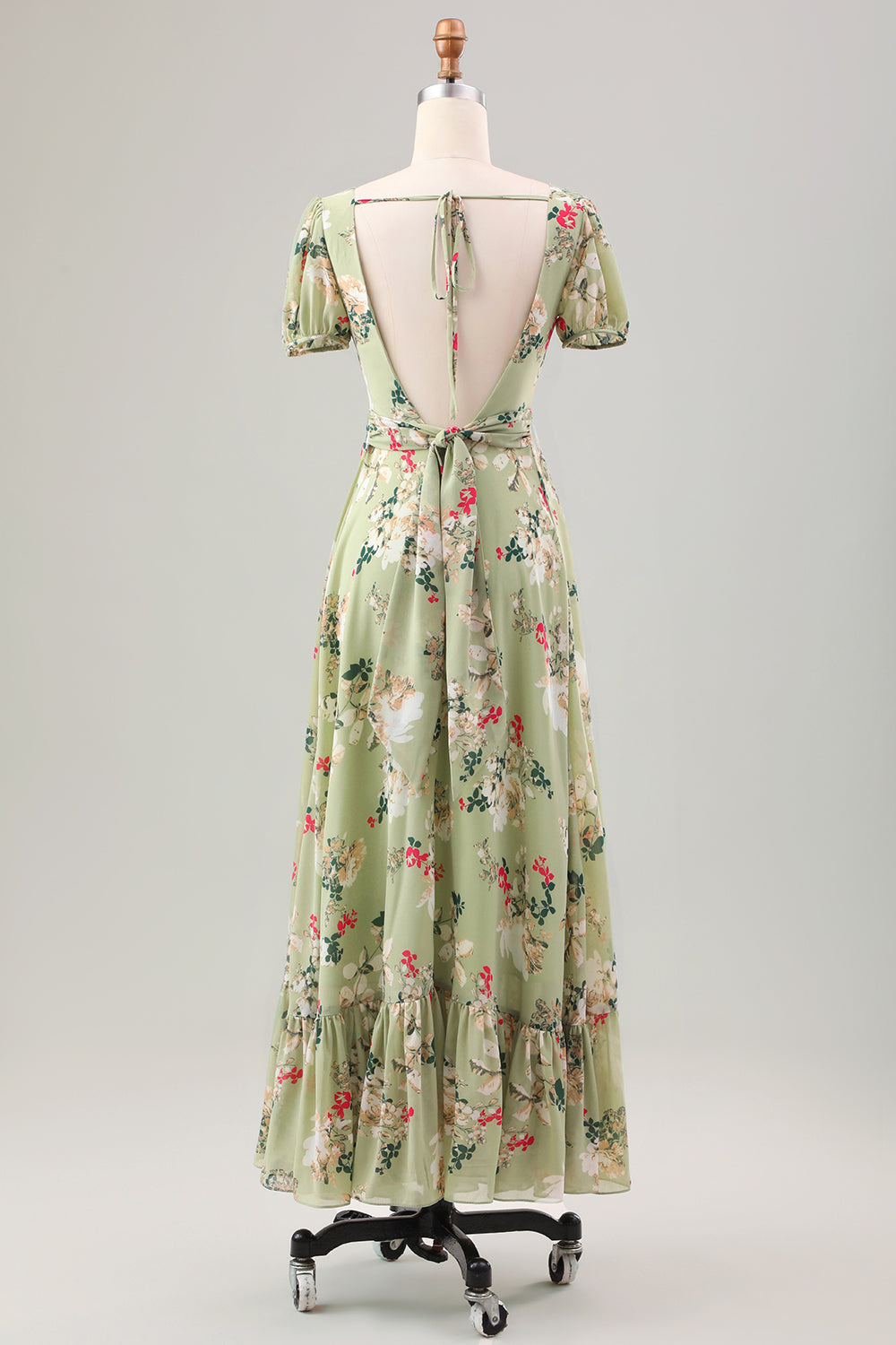 Robe de cocktail verte mi-longue avec encolure en V, manches courtes et coupe trapèze