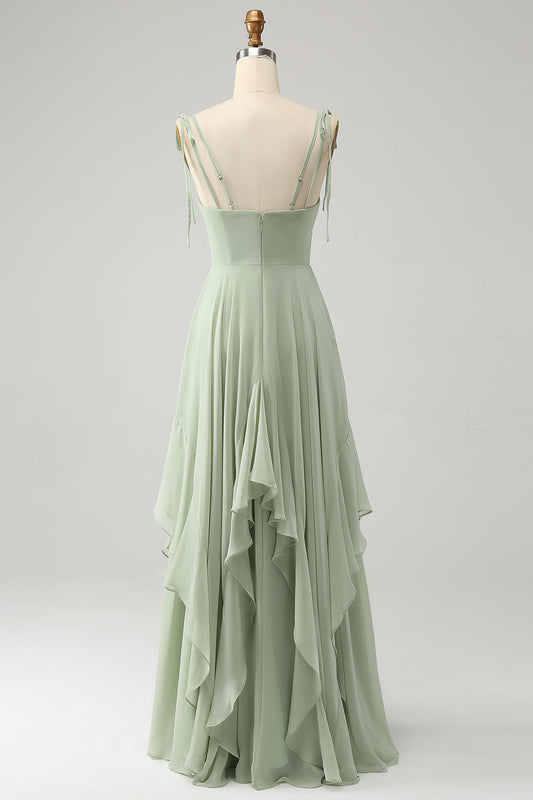 Robe de demoiselle d'honneur en mousseline matcha coupe trapèze à fines bretelles avec volants