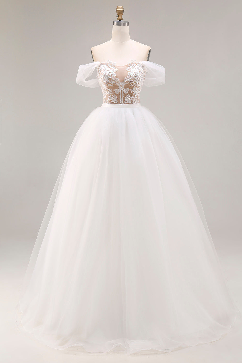 Vestido de novia largo de tul bordado color marfil sin hombros