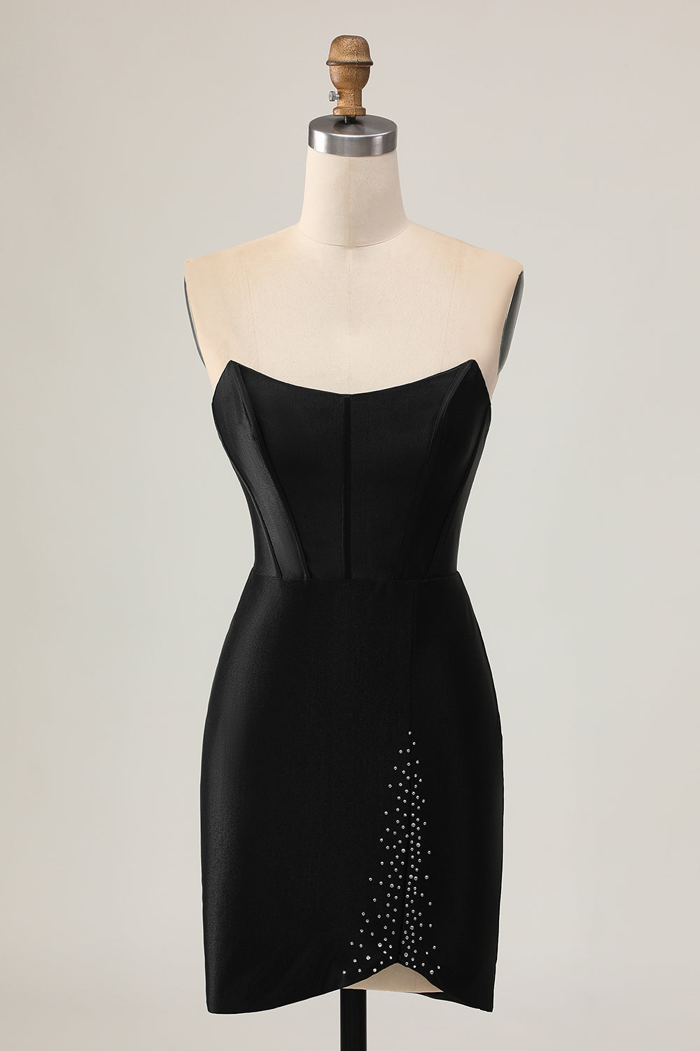 Robe de cocktail corset noire moulante ornée de perles et de découpes