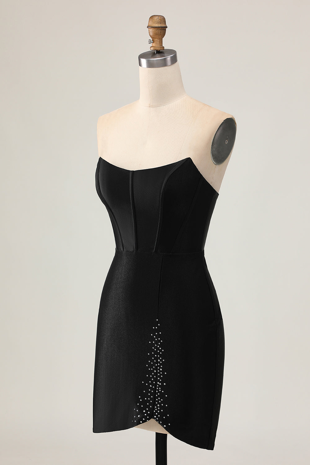 Robe de cocktail corset noire moulante ornée de perles et de découpes