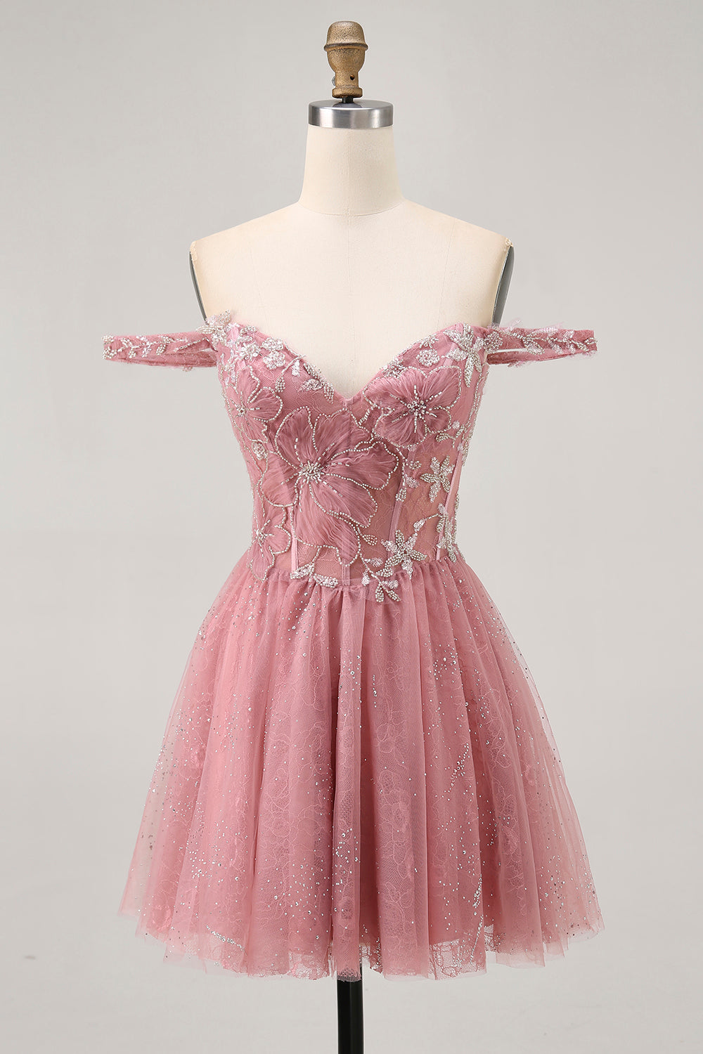 Robe de cocktail trapèze fleurie rose poudré épaules dénudées