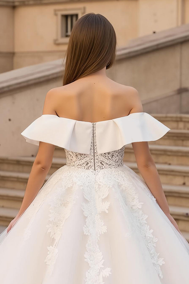 Robe de mariée ivoire, coupe trapèze, bustier, tulle, épaules dénudées