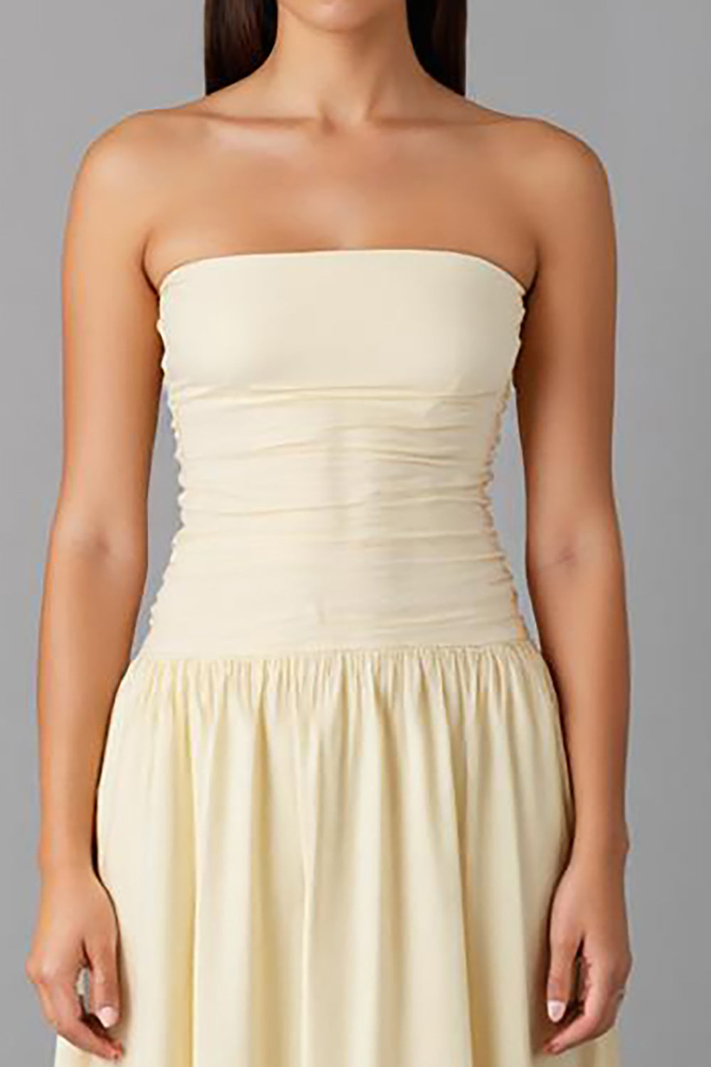Robe de soirée bustier trapèze en mousseline simple jonquille