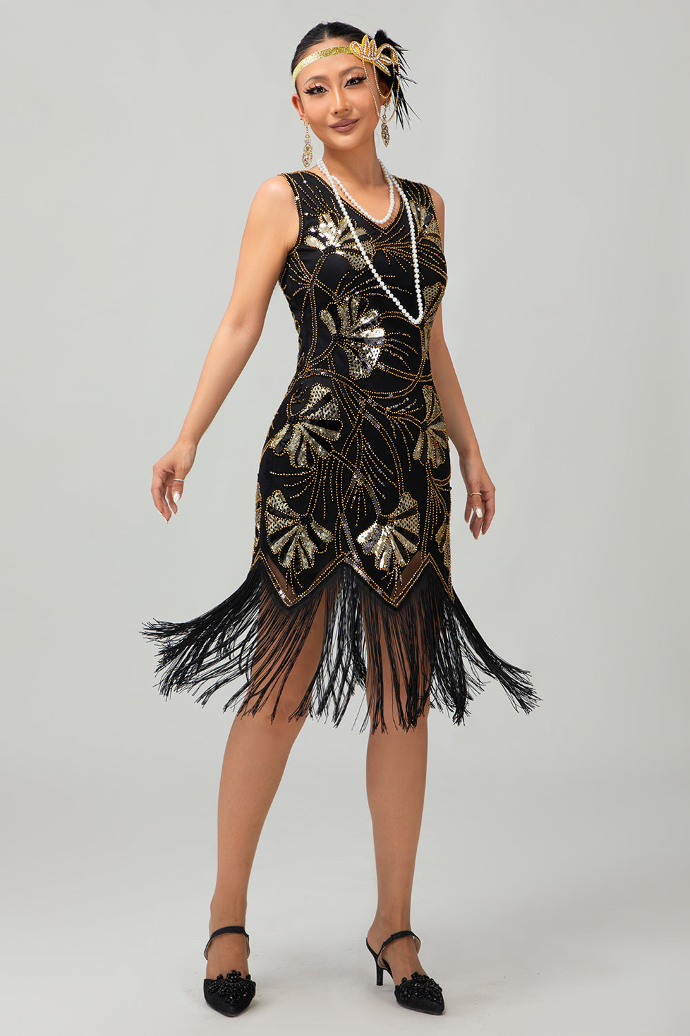 Robe Charleston noire scintillante à franges dorées