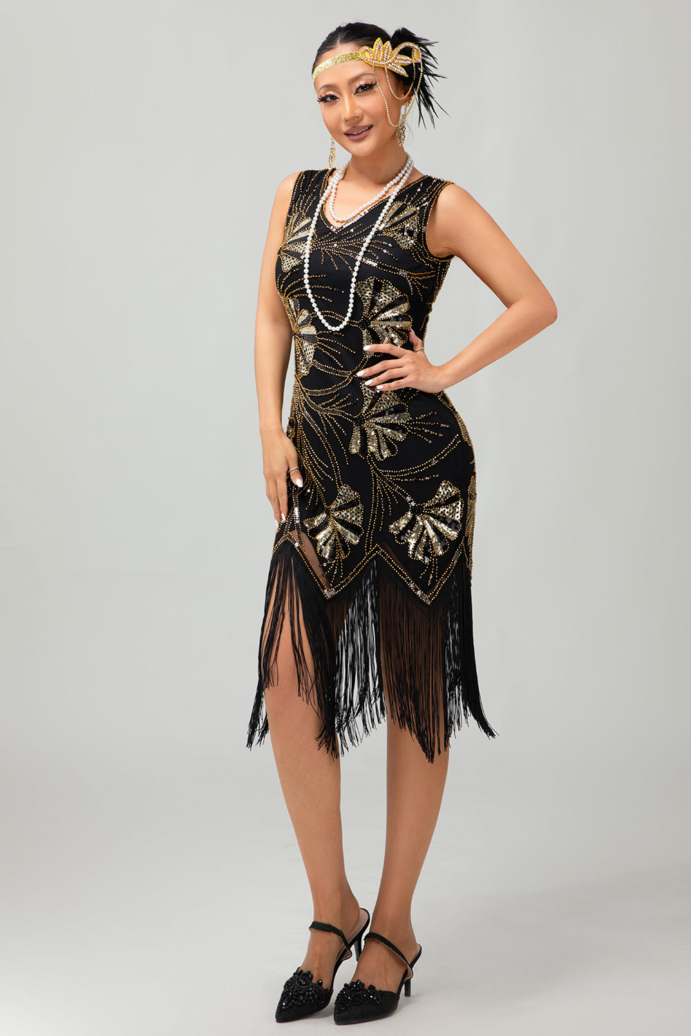 Robe Charleston noire scintillante à franges dorées