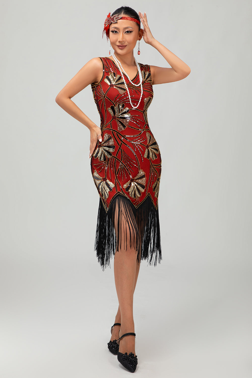 Robe Charleston noire scintillante à franges dorées