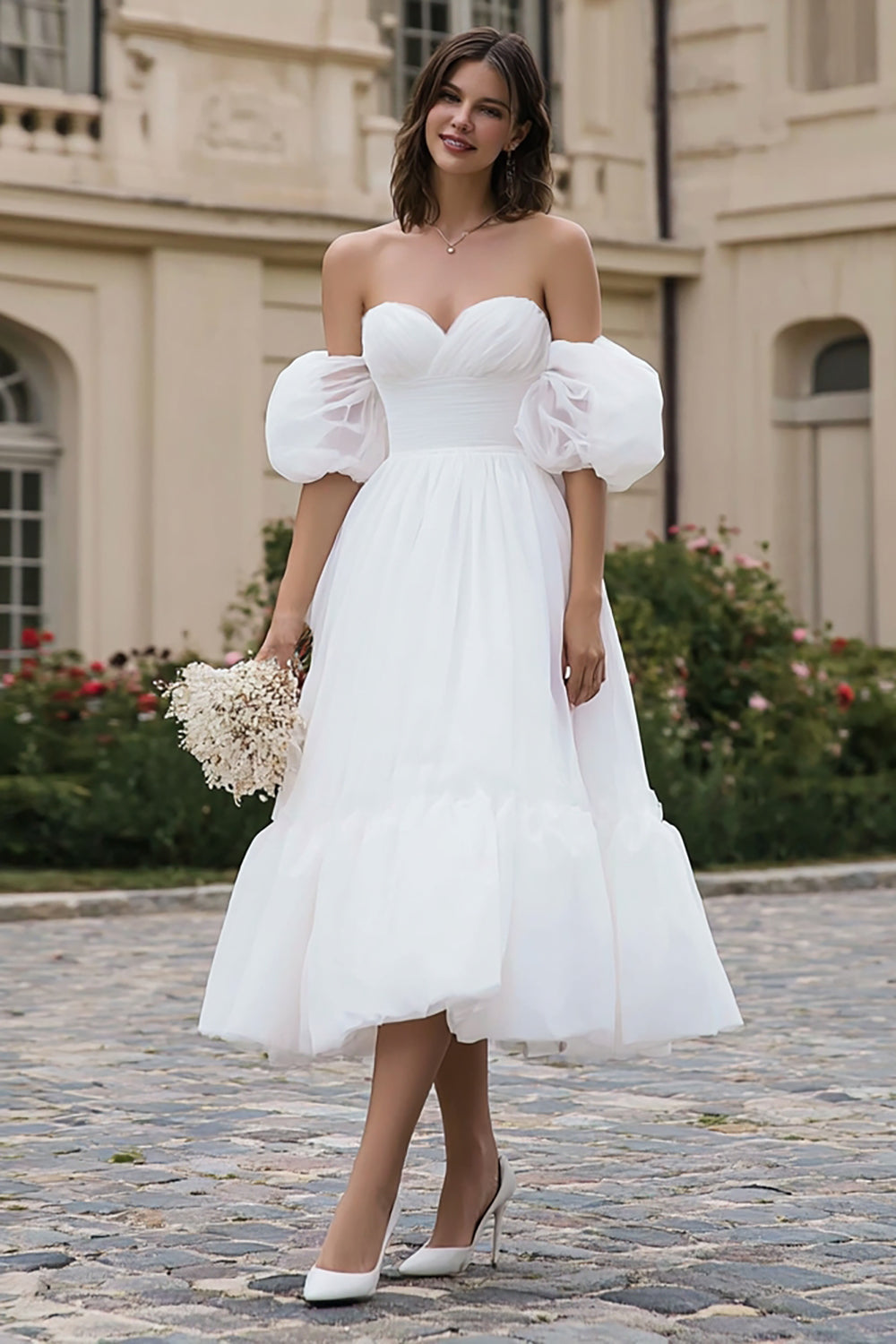 Robe de fiançailles trapèze ivoire décolleté cœur avec volants
