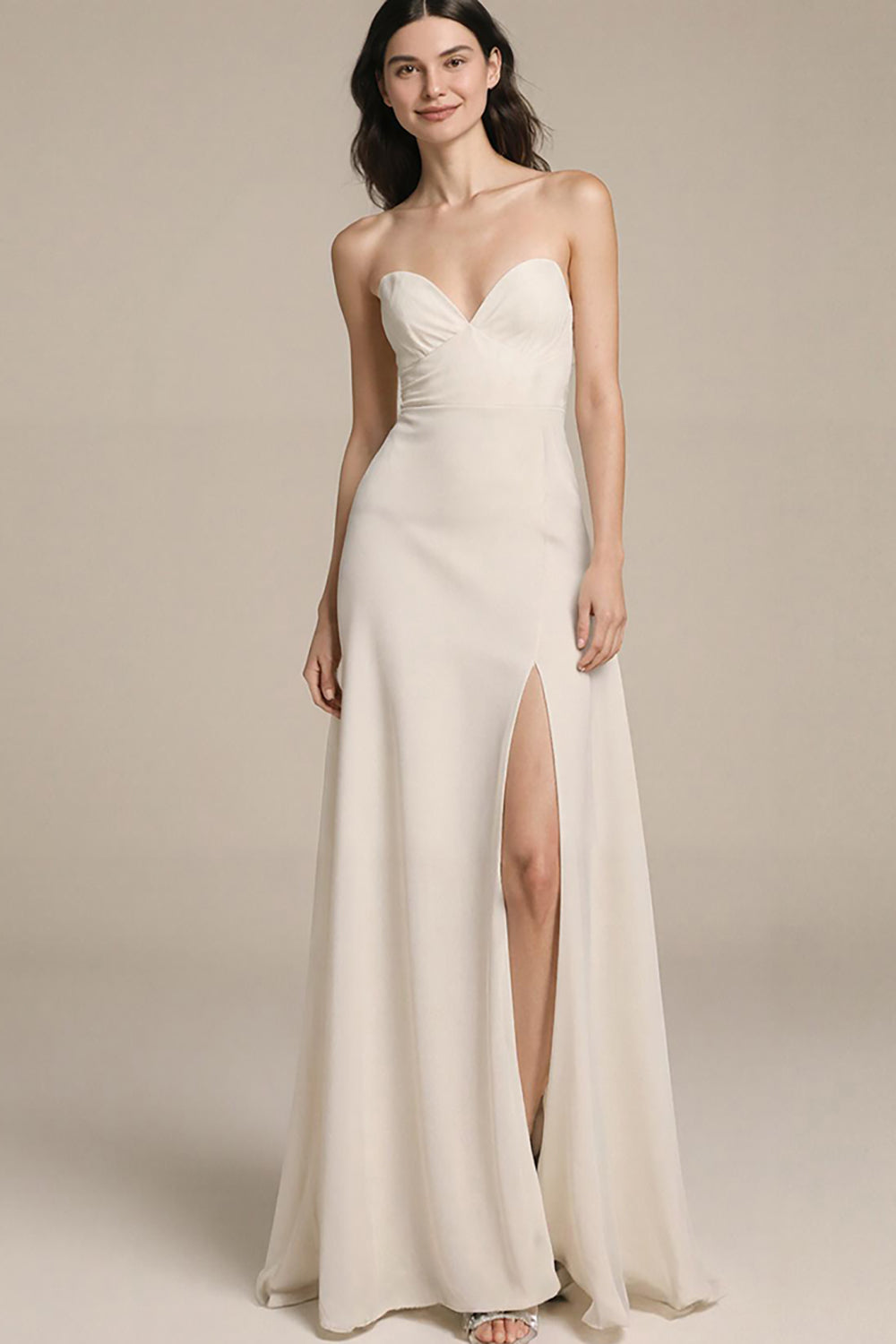 Robe de soirée bustier ivoire dos nu avec fente