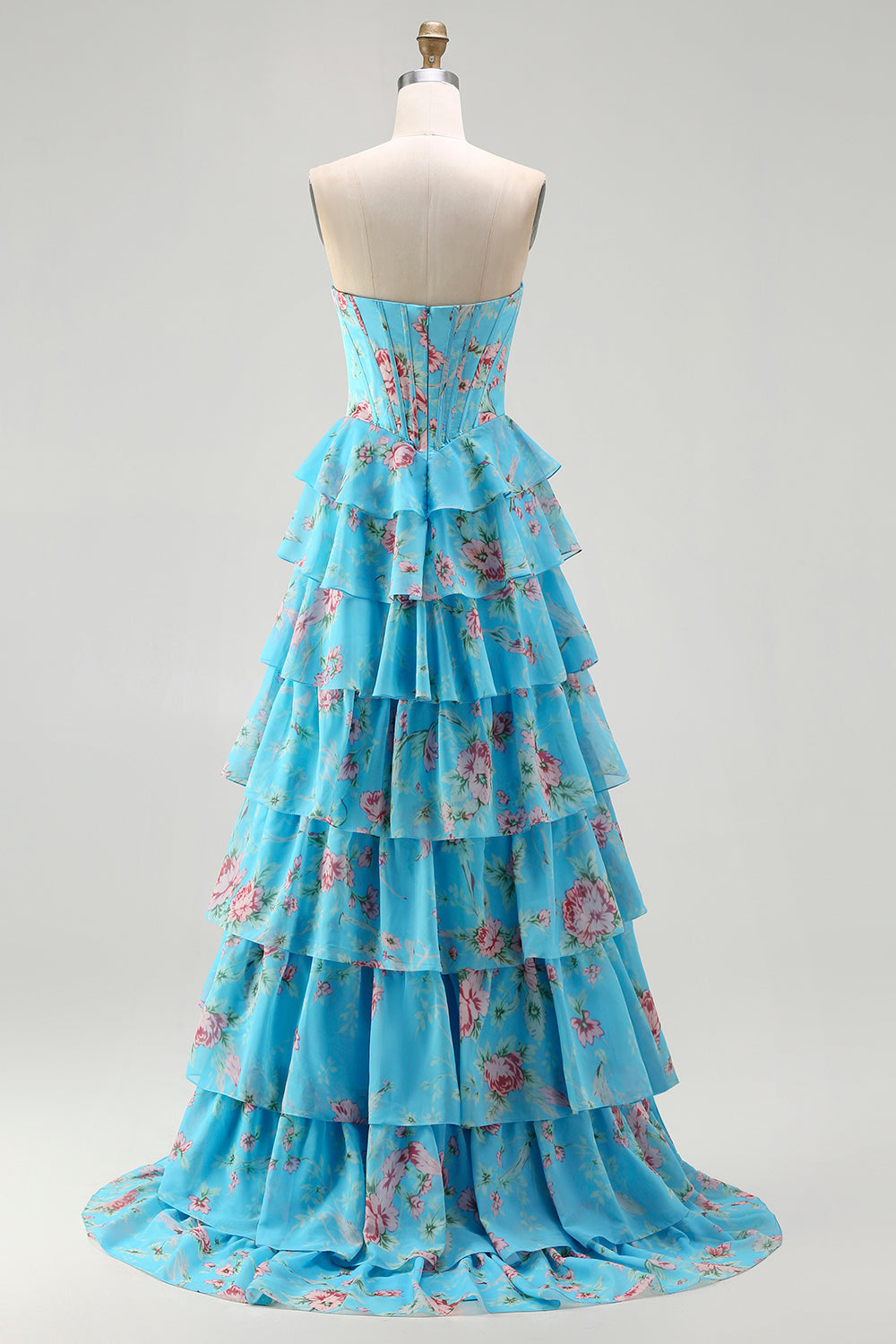 Robe de bal longue bleu foncé sans bretelles coupe trapèze avec bustier corset floral et jupe en mousseline à volants