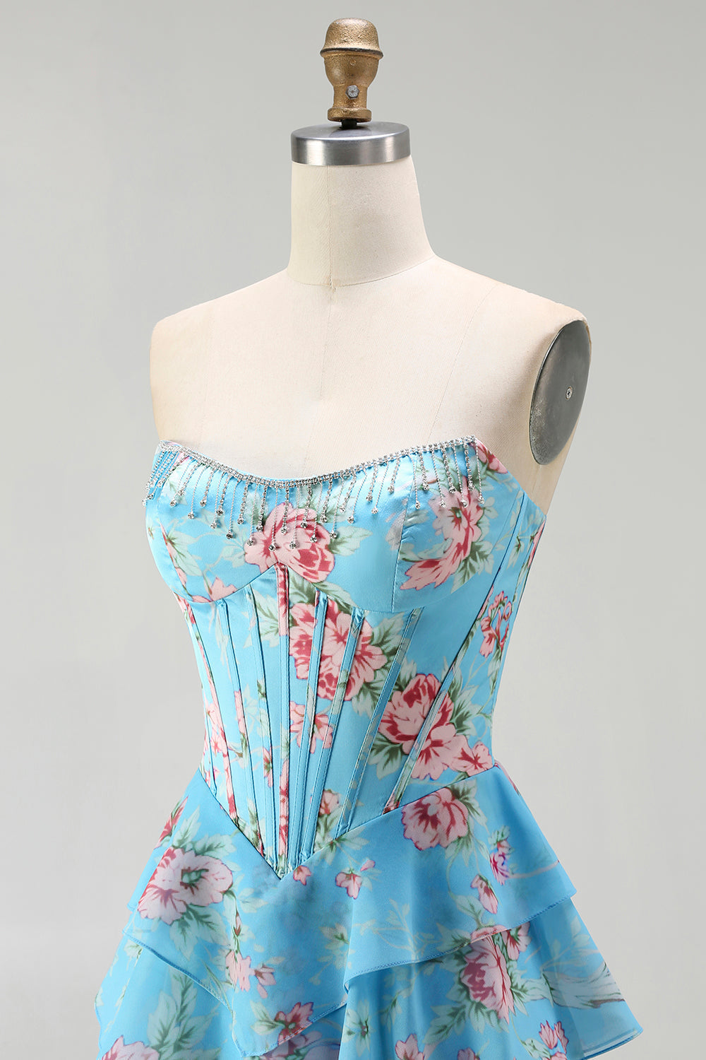 Robe de bal longue jaune sans bretelles, coupe trapèze avec corset, motif floral et jupe en mousseline à volants