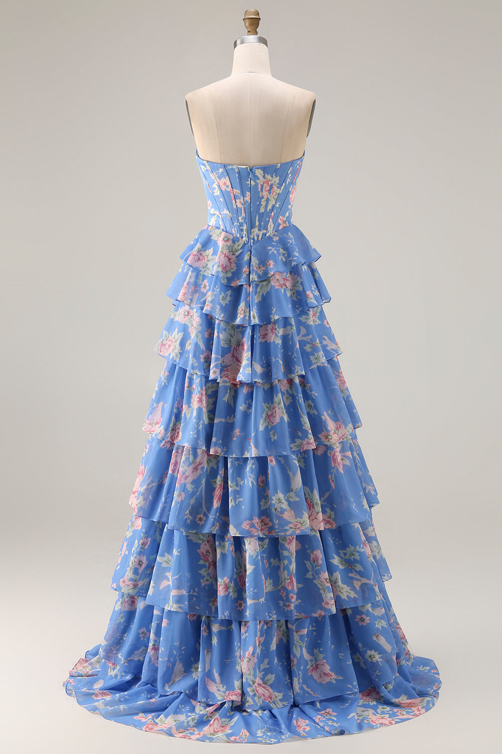 Robe de bal longue bleu foncé sans bretelles coupe trapèze avec bustier corset floral et jupe en mousseline à volants