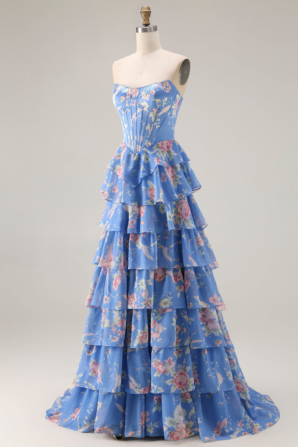 Robe de bal longue bleu foncé sans bretelles coupe trapèze avec bustier corset floral et jupe en mousseline à volants