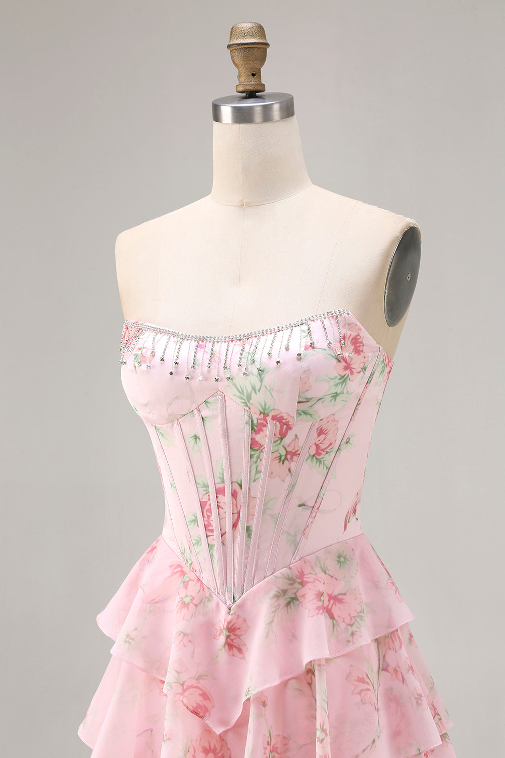 Robe de bal longue jaune sans bretelles, coupe trapèze avec corset, motif floral et jupe en mousseline à volants