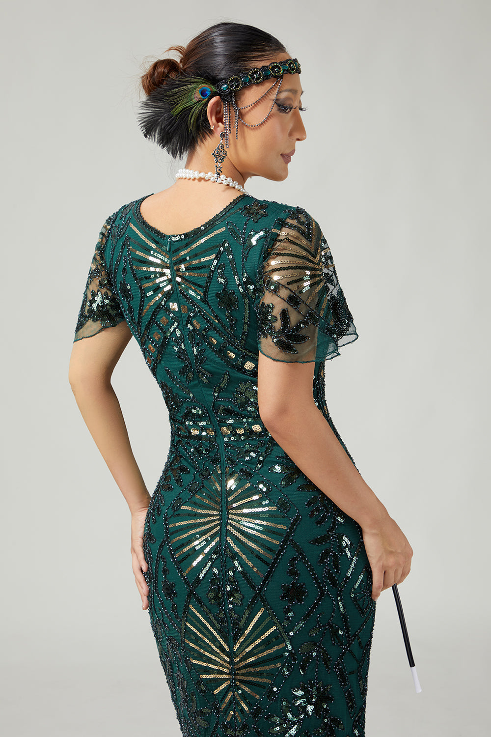 Robe crayon vert foncé scintillante style années 20 avec franges