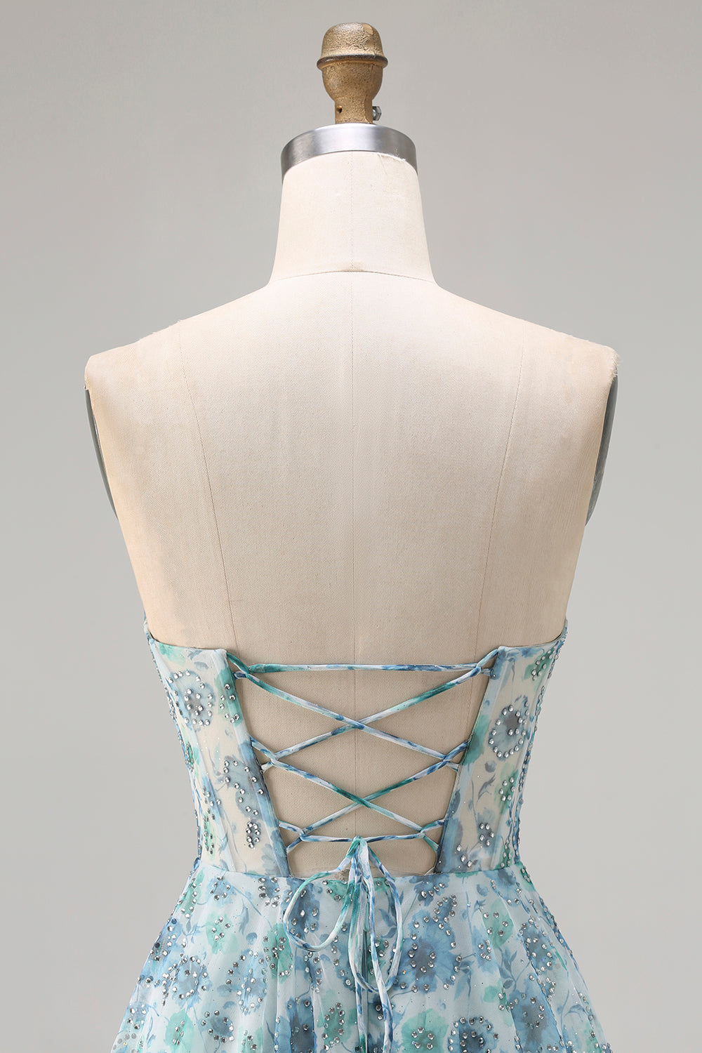 Robe de bal longue convertible sans bretelles bleue à fleurs avec perles et fente coupe trapèze