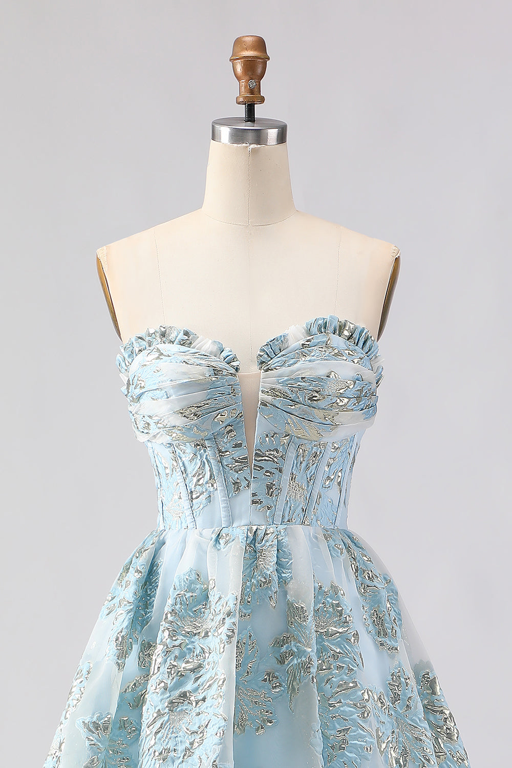 Robe de bal longue en jacquard rose coupe trapèze, bustier et fente