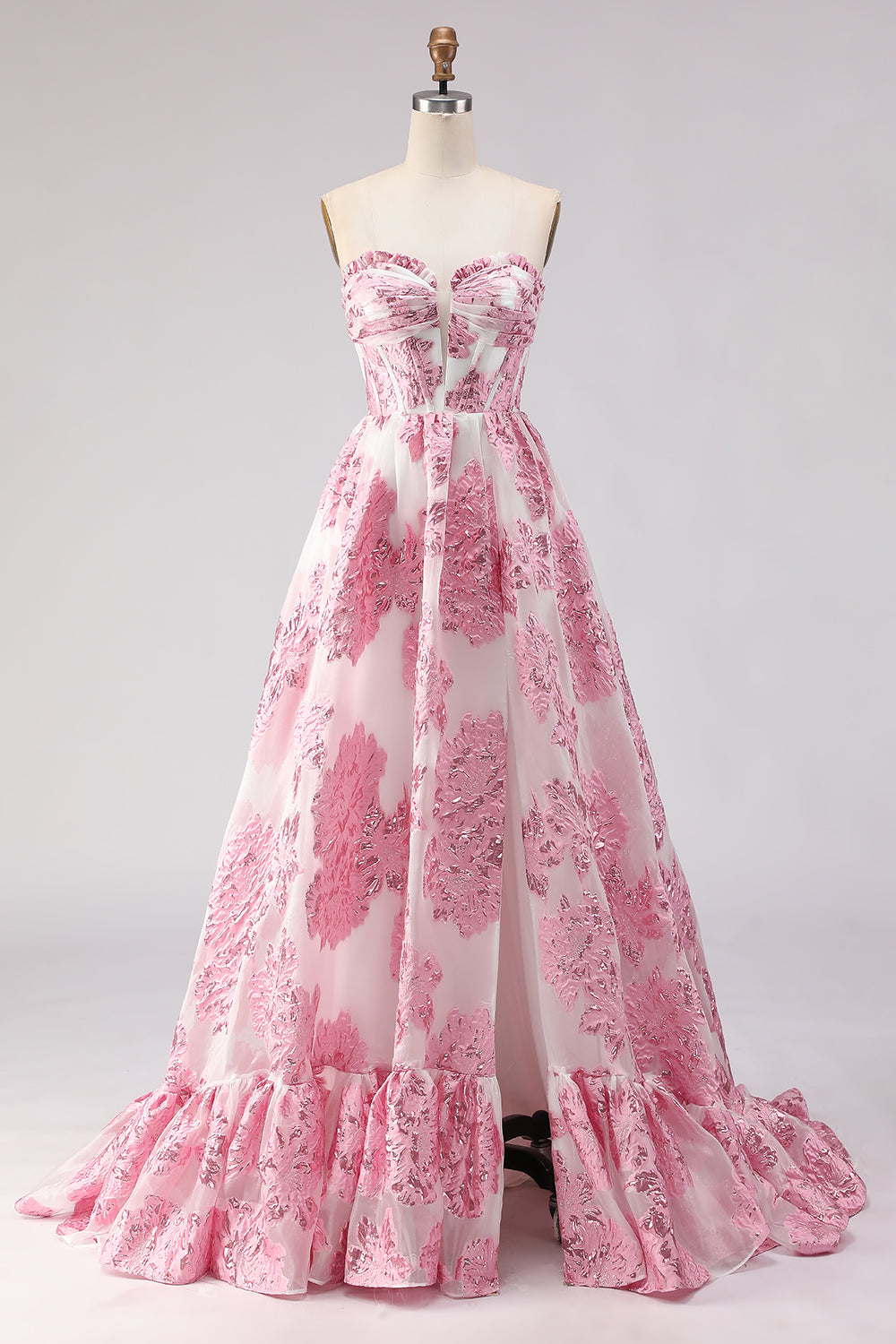 Robe de bal longue en jacquard rose coupe trapèze, bustier et fente