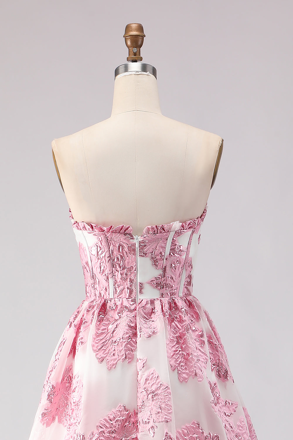 Robe de bal longue en jacquard rose coupe trapèze, bustier et fente