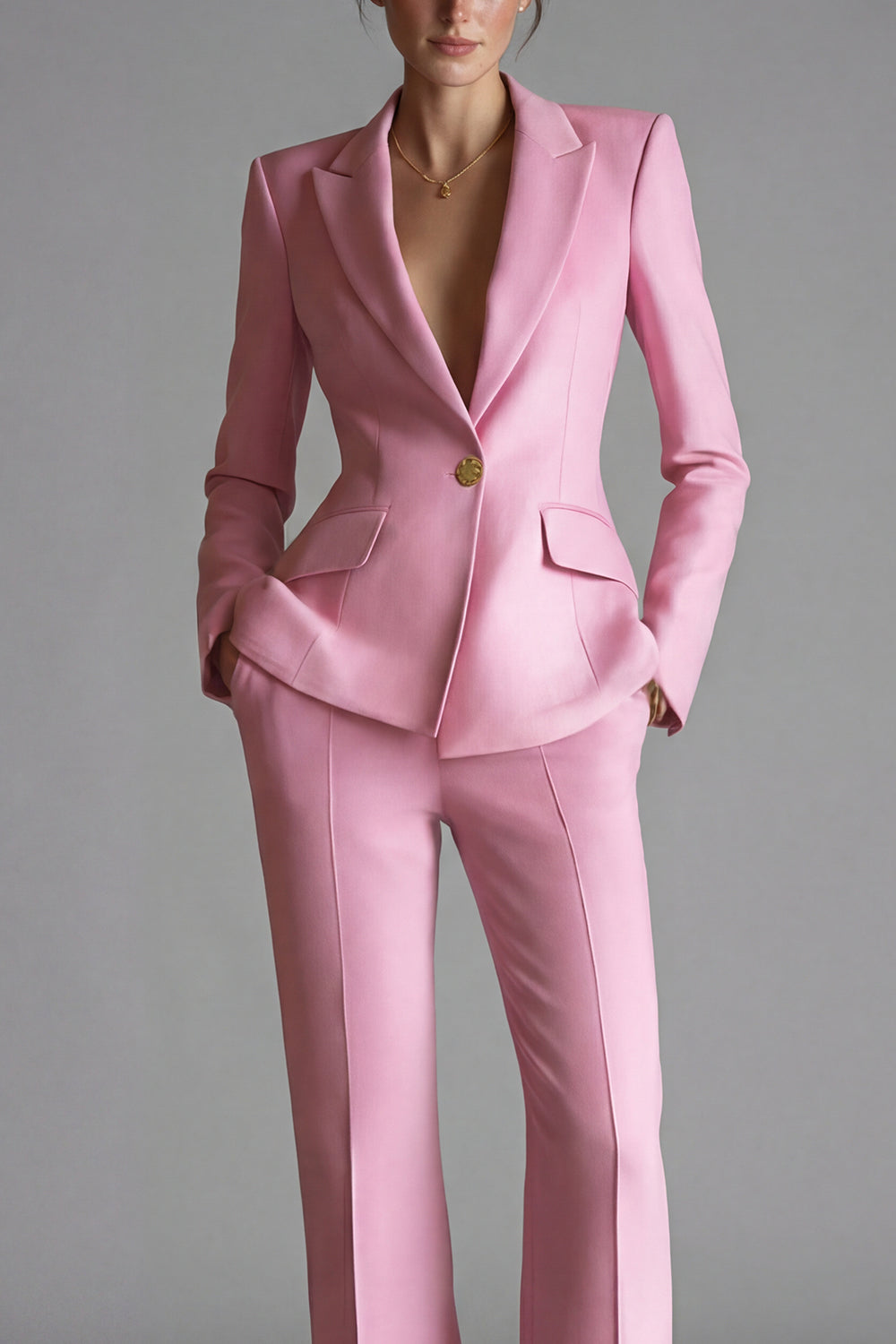 Costume de travail 2 pièces rose à revers pointus et un bouton pour femme