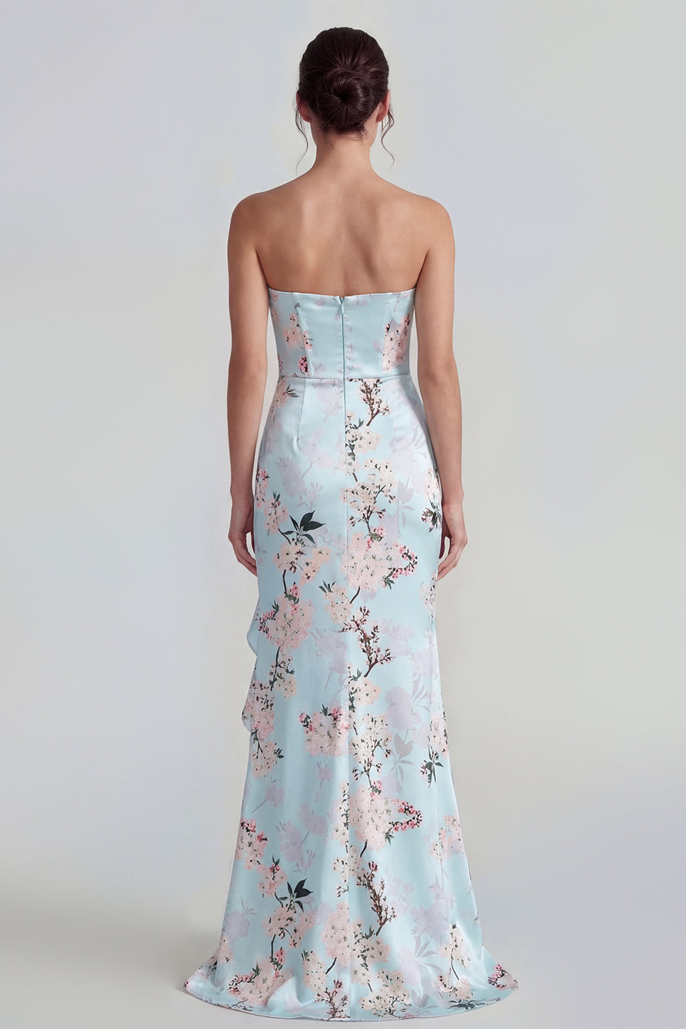 Robe longue fourreau bustier rose à corset et motif floral, avec fente à volants