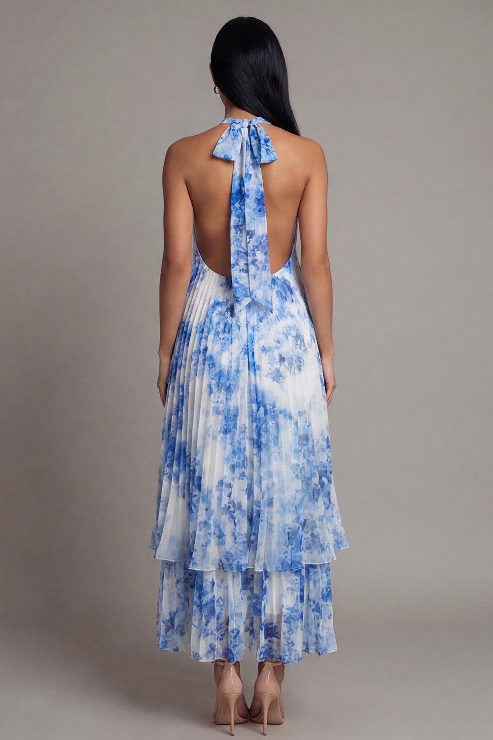 Robe longue plissée bleu ciel à nœud et dos nu coupe trapèze