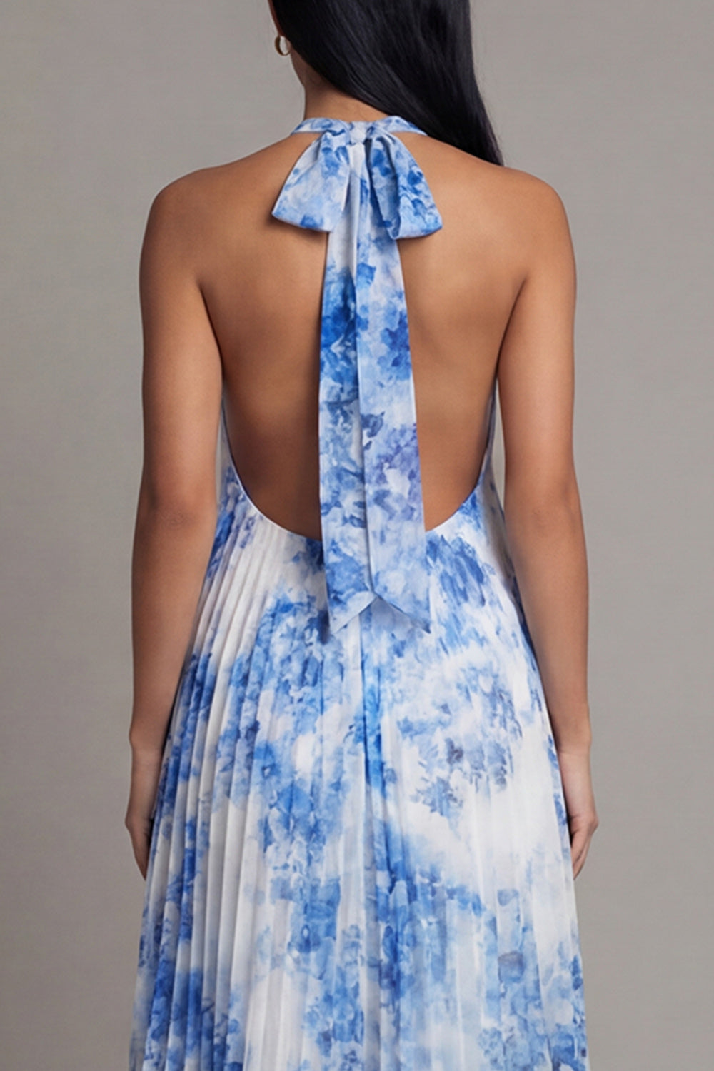Robe longue plissée bleu ciel à nœud et dos nu coupe trapèze