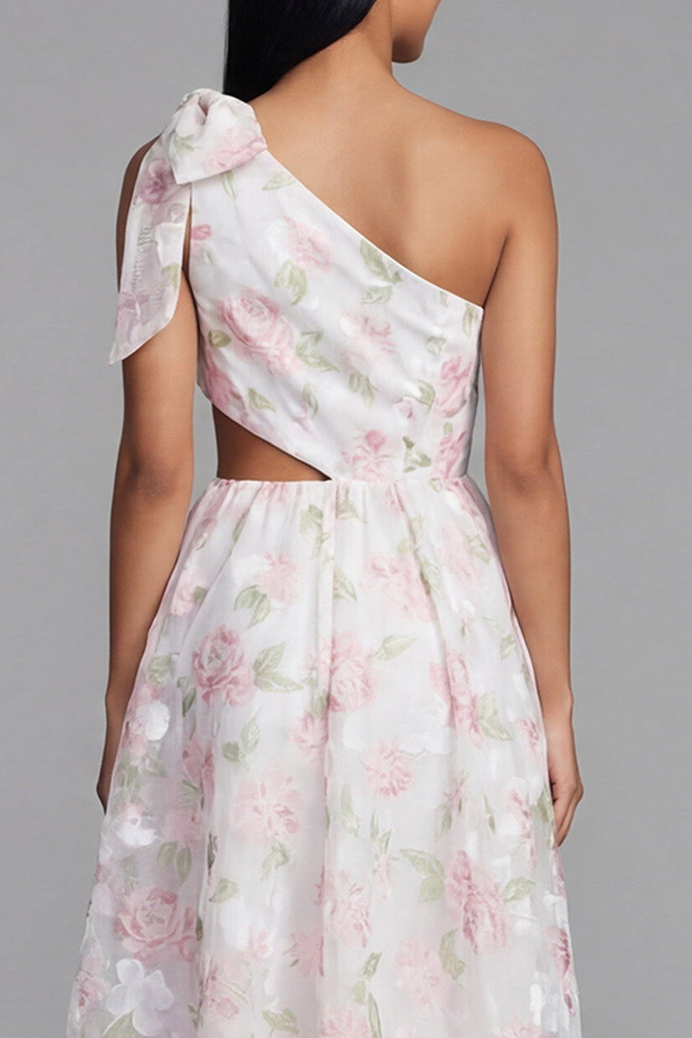 Robe trapèze asymétrique en mousseline florale blanche et rose à découpes et nœud