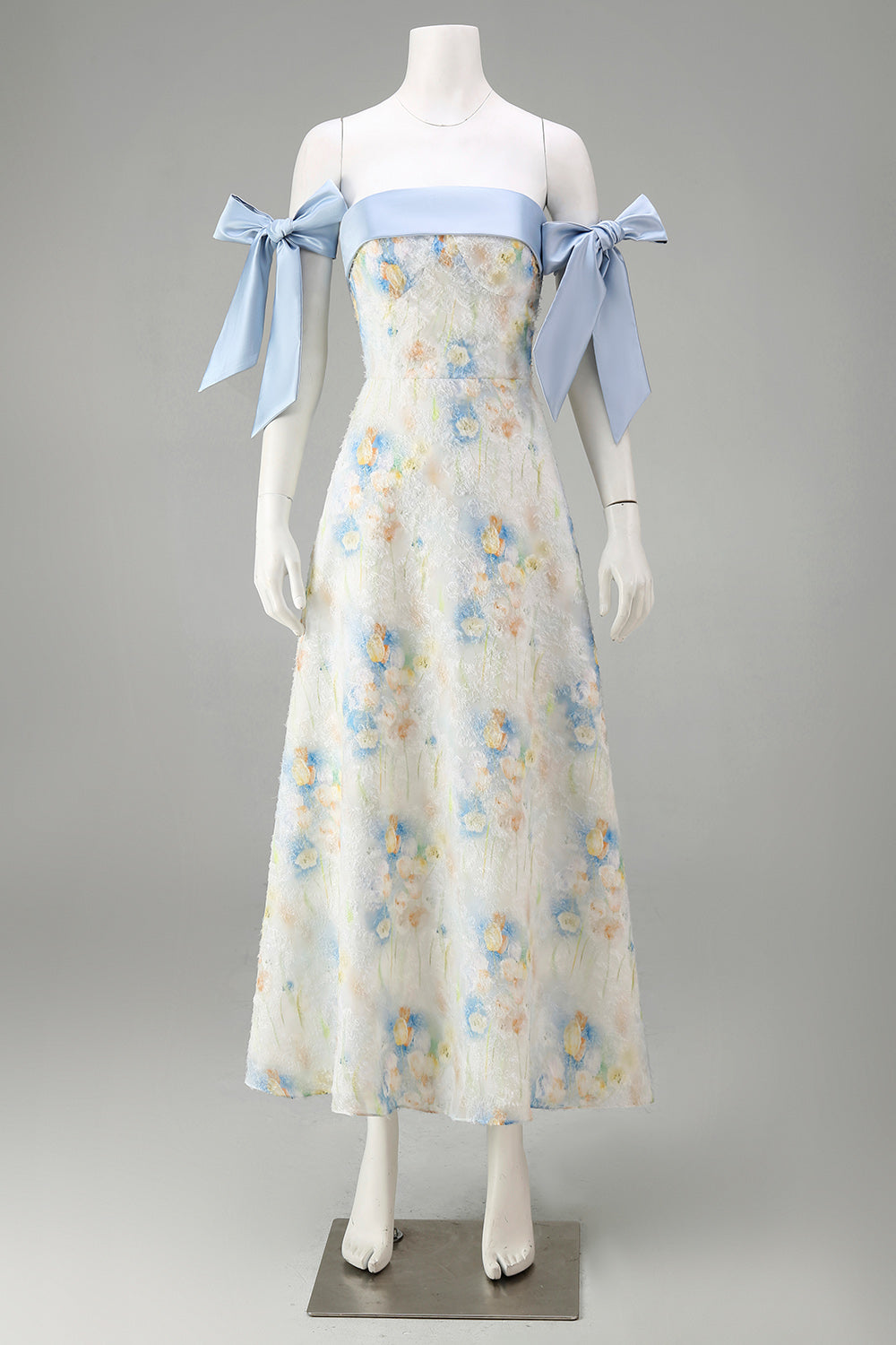 Robe de soirée longue trapèze bleu clair à motif floral et nœuds