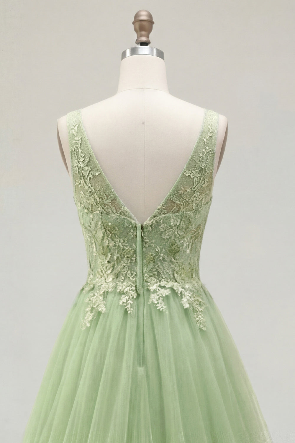 Robe de bal longue verte à bretelles spaghetti, coupe évasée, ornée de motifs floraux et d'appliqués