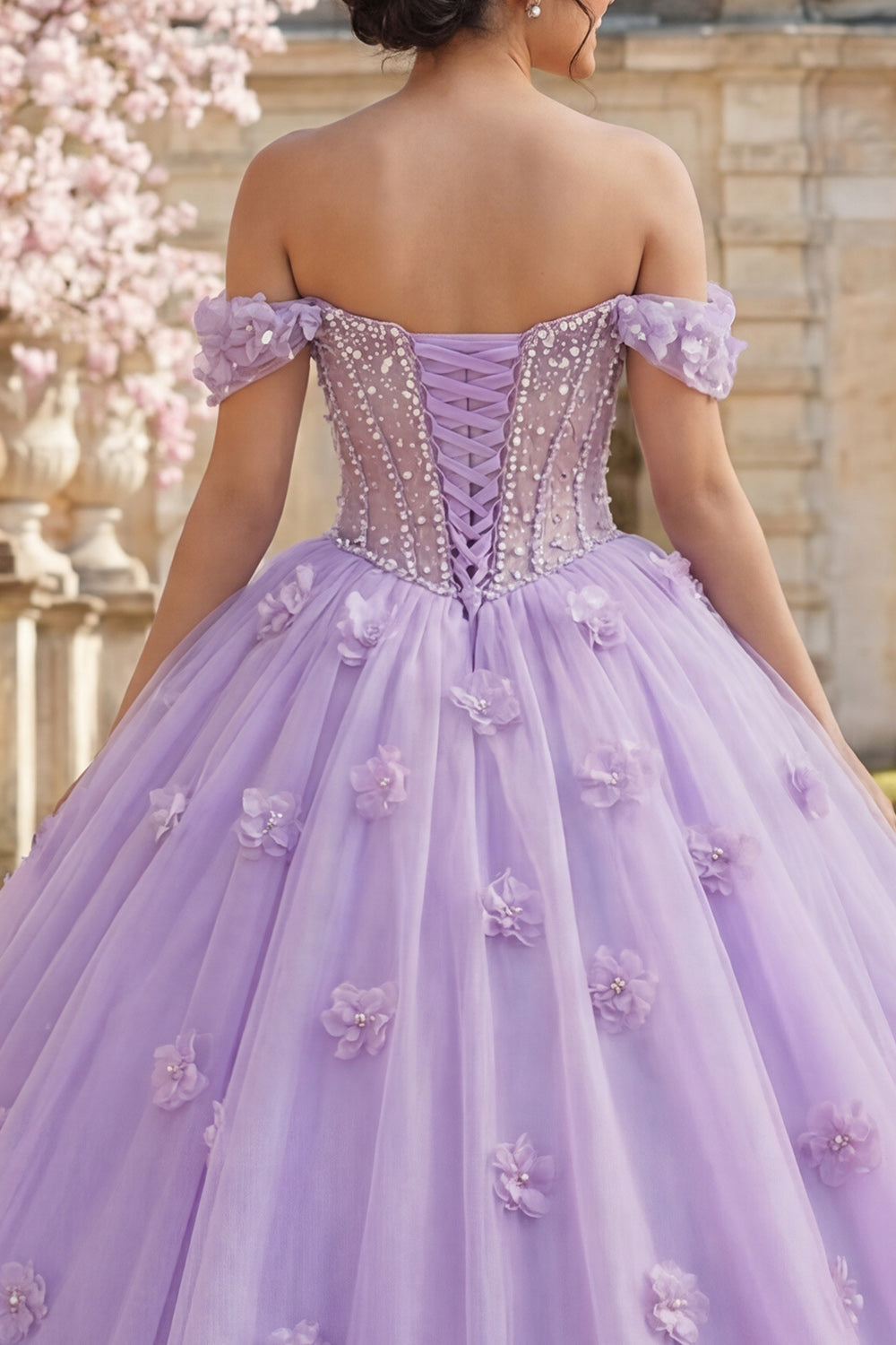Vestido de quinceañera lila de gala con corsé, hombros descubiertos y flores 3D