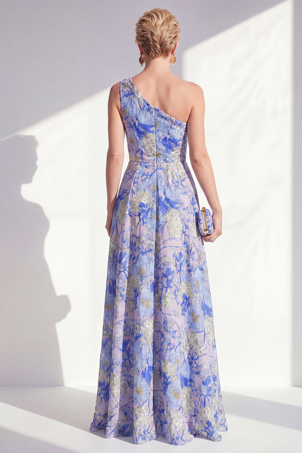 Robe longue de mère de la mariée bleue asymétrique à volants floraux et fendue