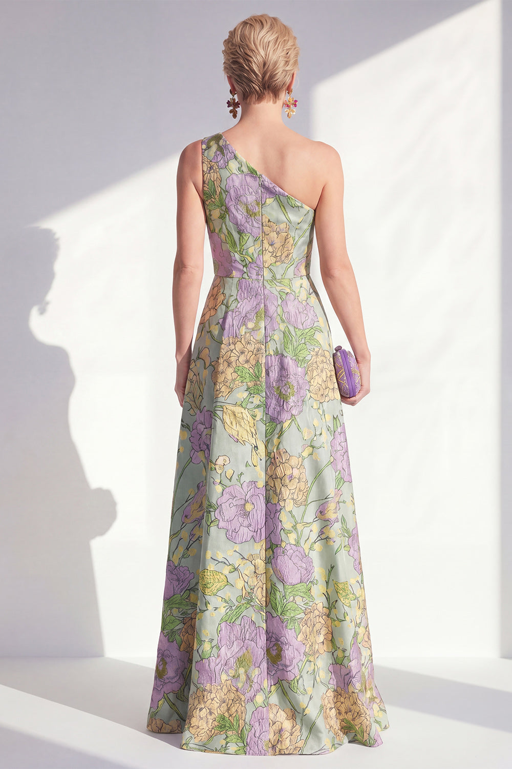 Robe longue de mère de la mariée bleue asymétrique à volants floraux et fendue