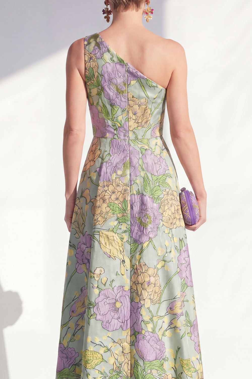 Robe longue de mère de la mariée bleue asymétrique à volants floraux et fendue