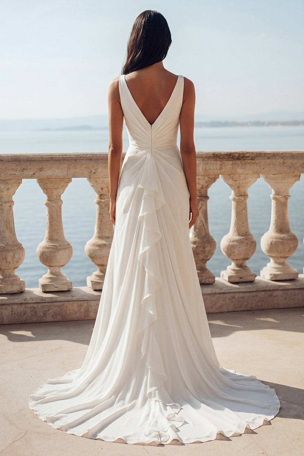 Robe de mariée sirène ivoire à volants drapée col en V