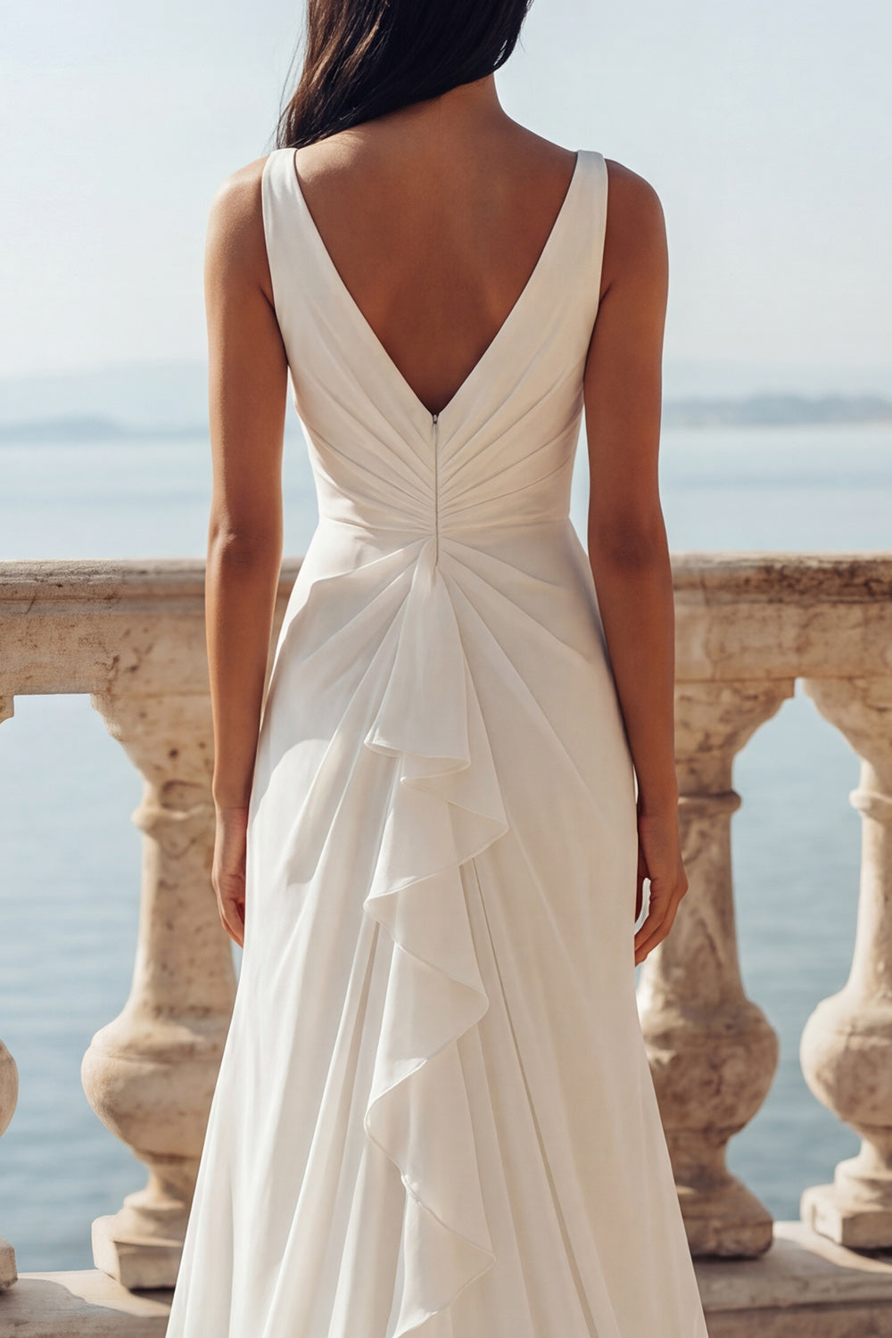 Robe de mariée sirène ivoire à volants drapée col en V