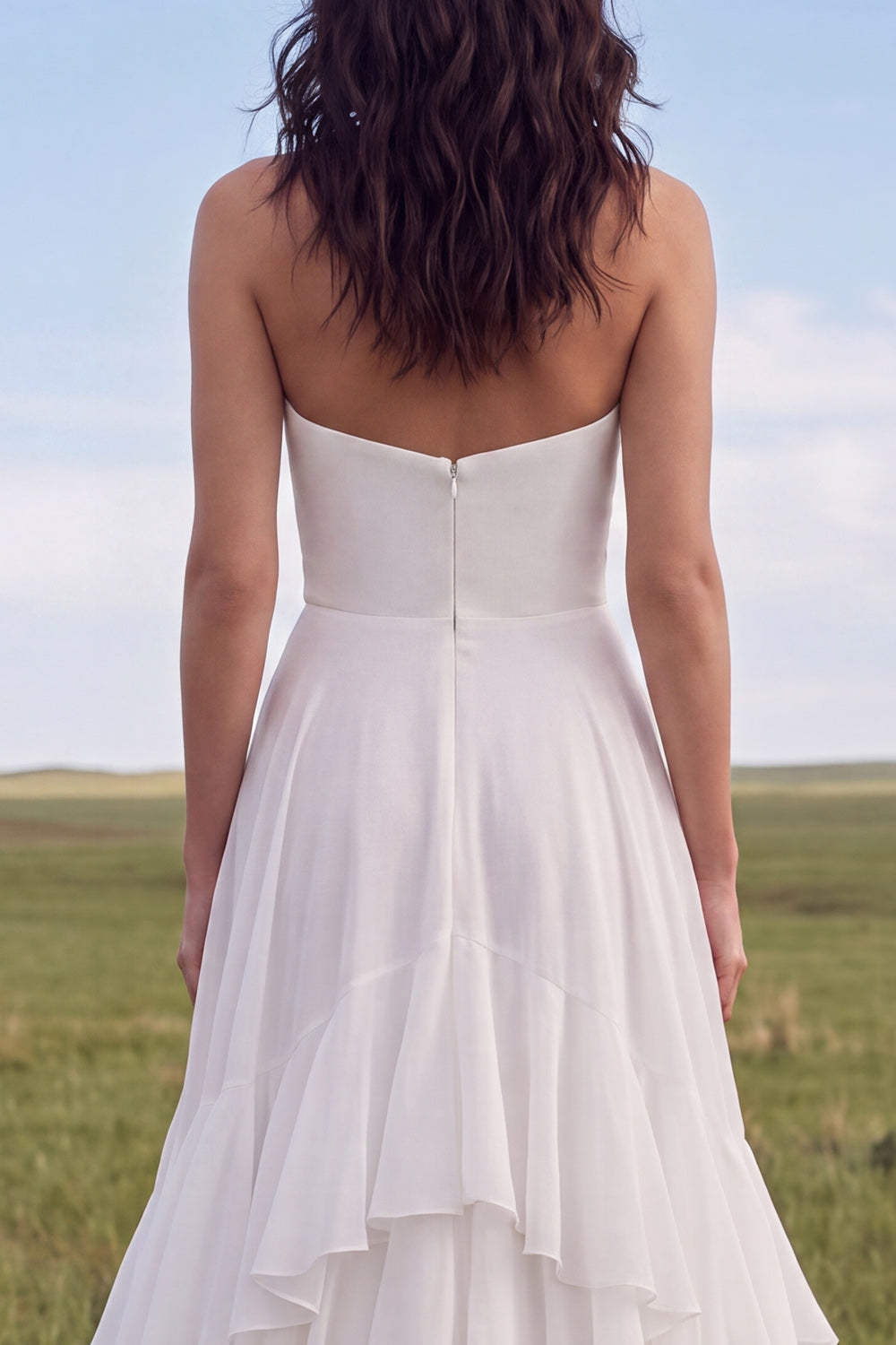 Robe de mariée bustier bohème ivoire évasée avec fente et volants