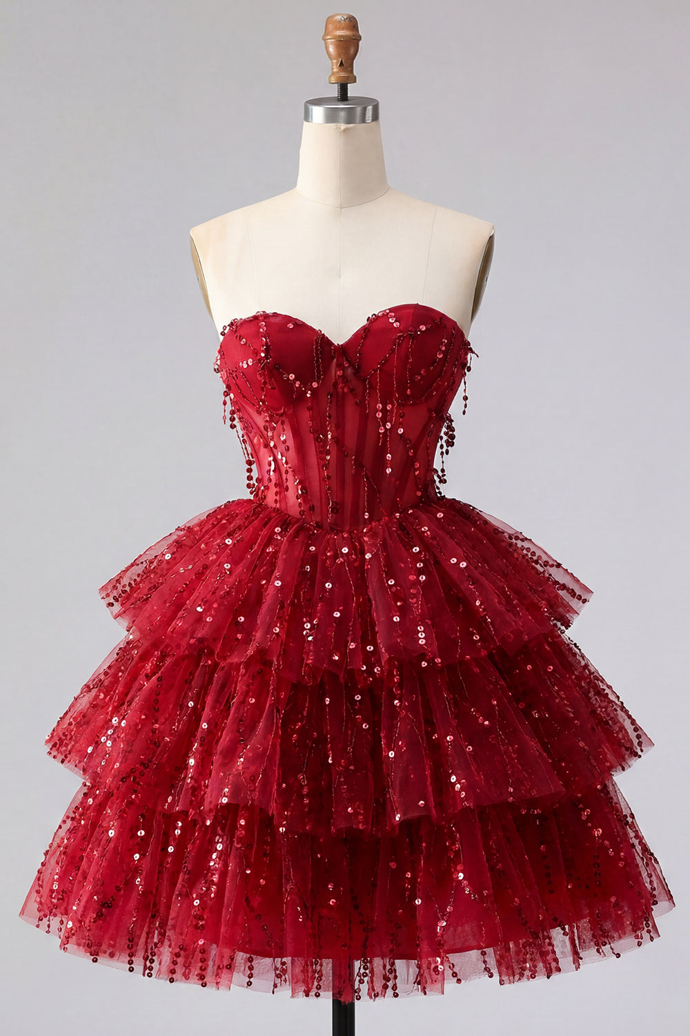 Robe de soirée bustier bordeaux ligne A avec corsage étagé et sequins
