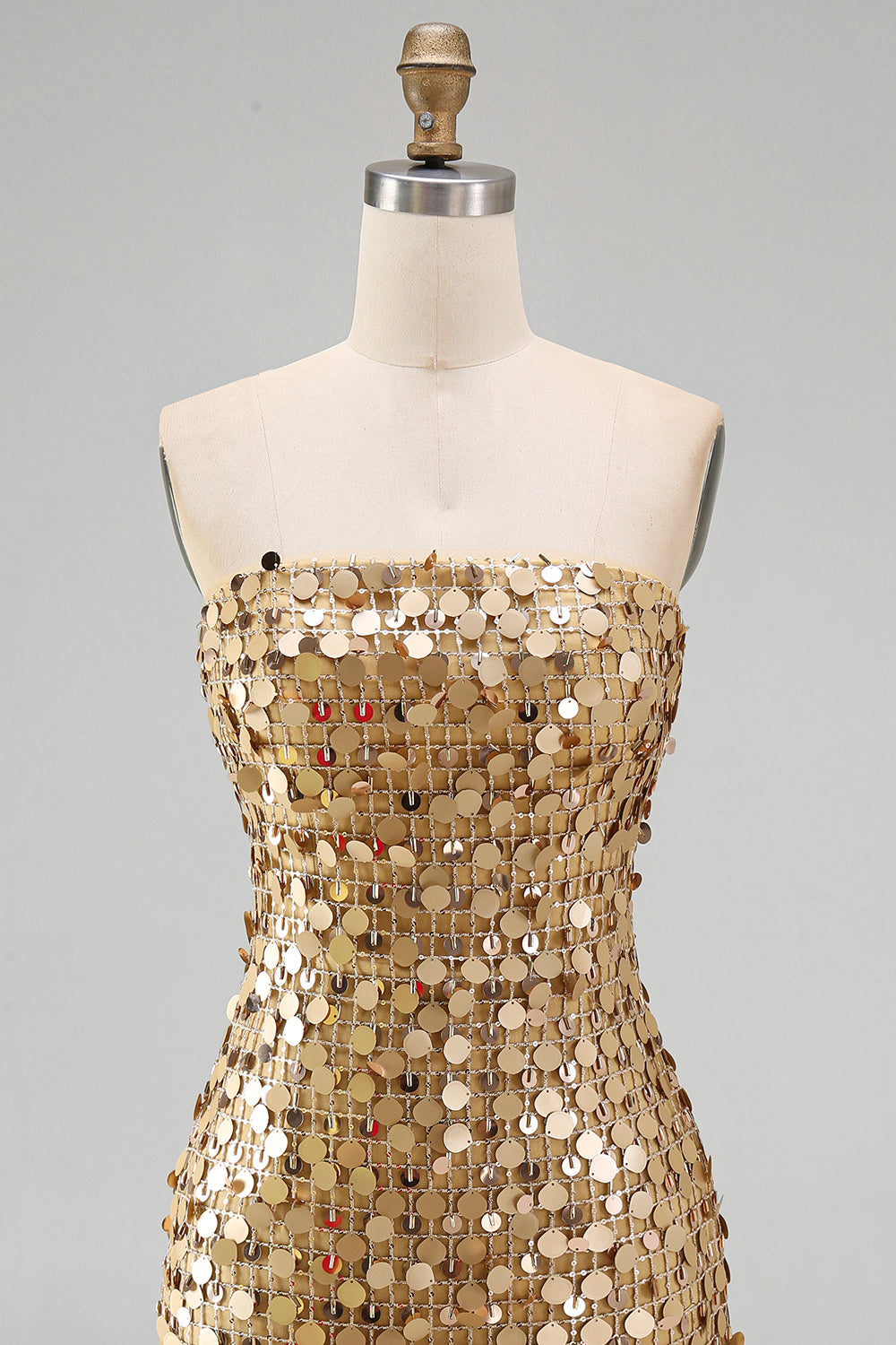 Robe de bal moulante bustier à paillettes dorées scintillantes