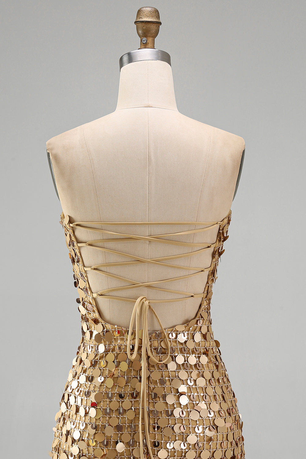 Robe de bal moulante bustier à paillettes dorées scintillantes