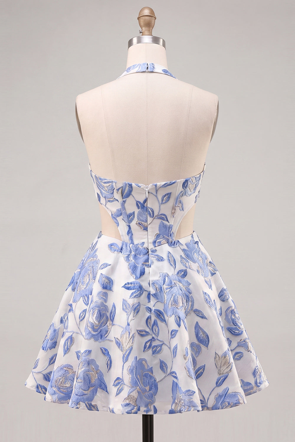 Robe de cocktail dos nu, coupe trapèze, à licou, bleu clair, avec découpes et motif floral