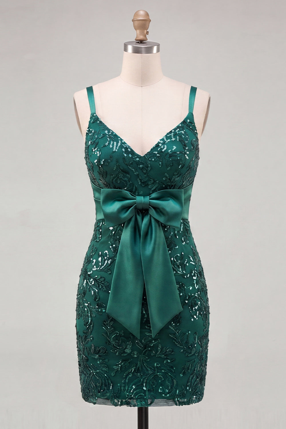 Robe de bal moulante vert foncé à bretelles spaghetti, paillettes et dos lacé avec nœud