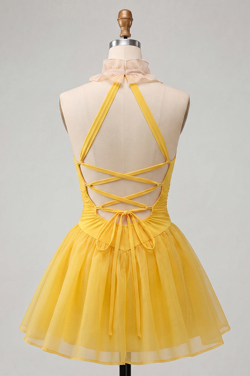 Robe de bal dos nu trapèze jaune froncée à volants avec laçage au dos