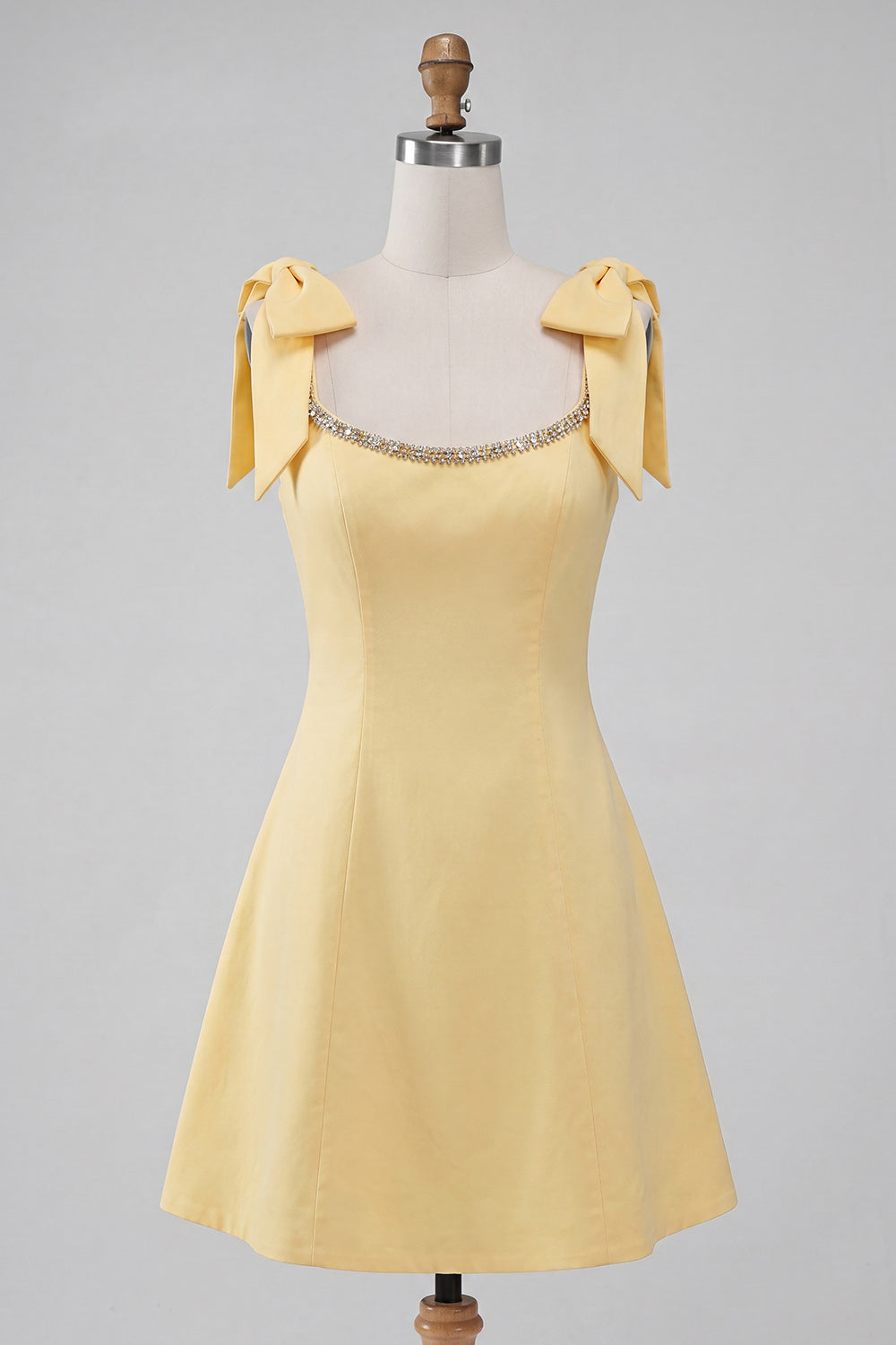 Robe de bal courte évasée jaune clair avec bretelles à nœud et dos lacé