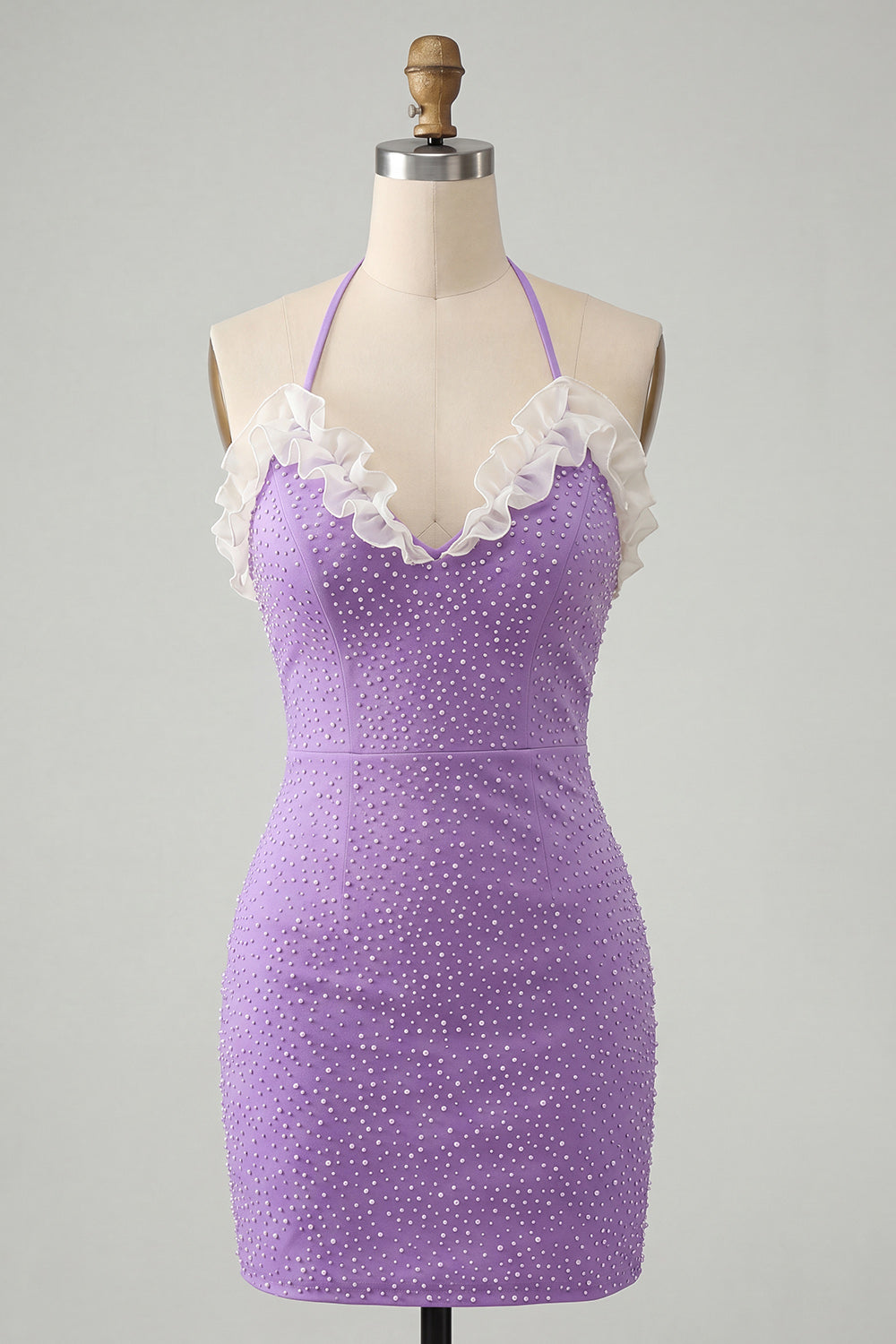 Robe de cocktail moulante lilas avec dos lacé, col halter, volants et perles