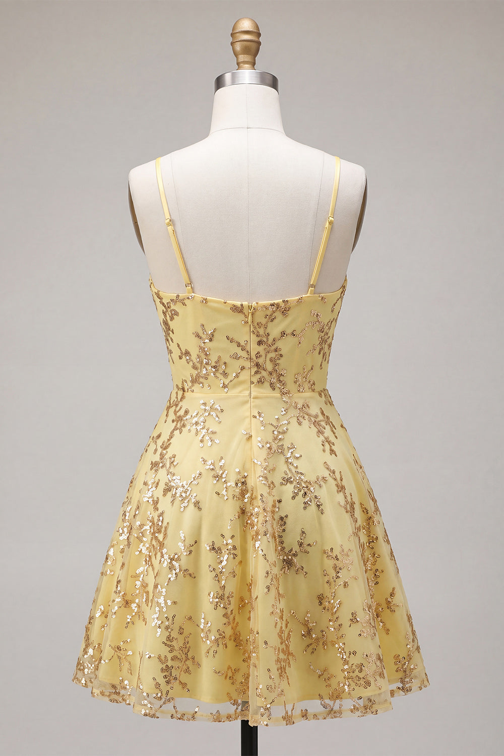 Robe de bal courte trapèze jaune à fines bretelles et sequins