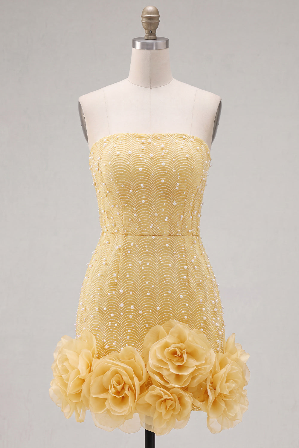 Vestido de fiesta azul sin tirantes entallado con perlas y flores 3D