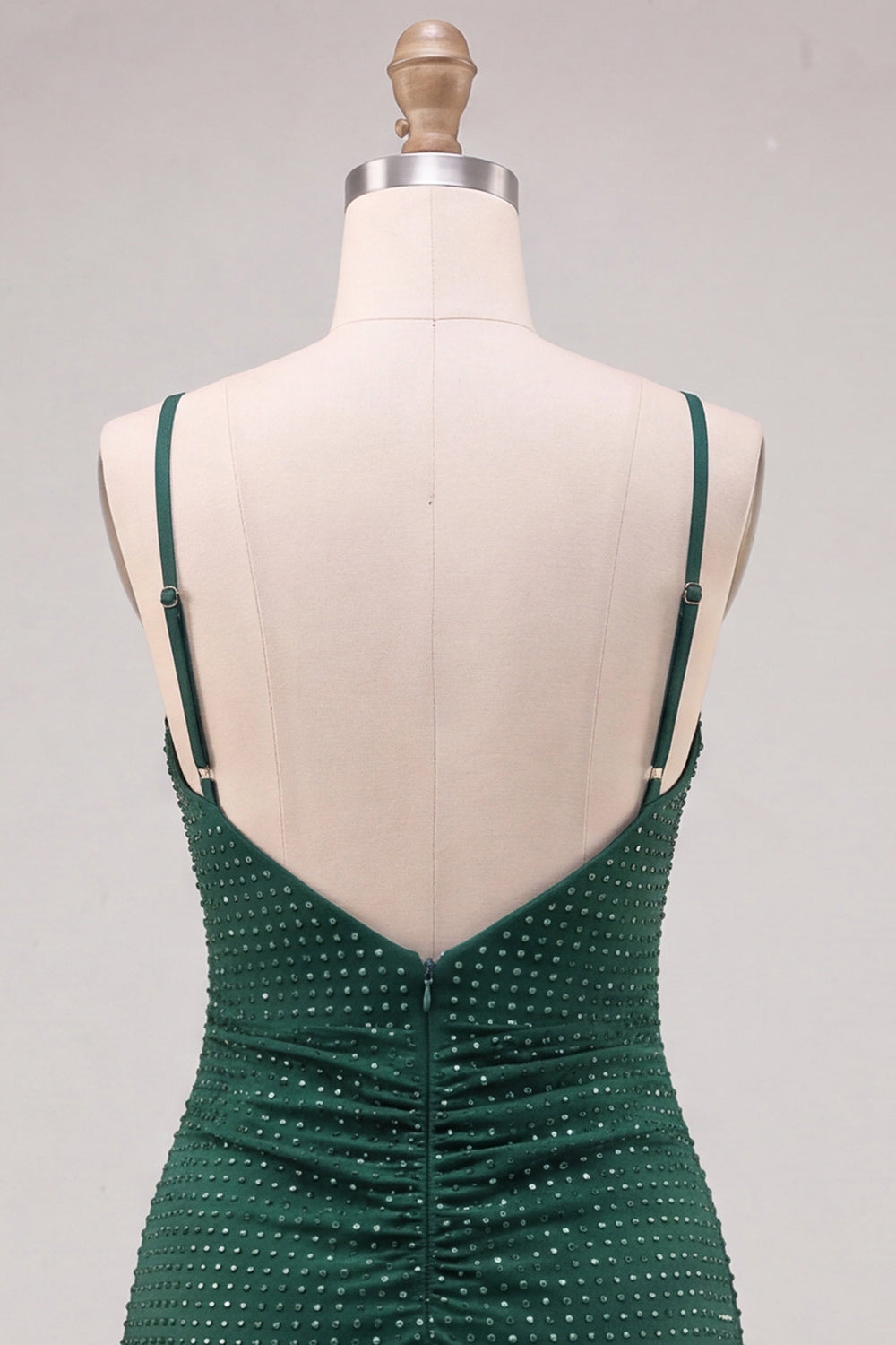 Robe de bal bustier froncée vert foncé à bretelles spaghetti perlée avec fente